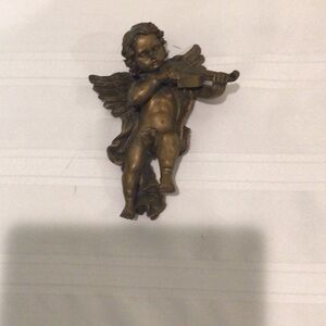 Bronze cherub wall hanging